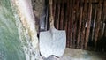 Shed tools cement covered shovel