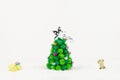 Sheep and dog looking Christmas tree isolated on white background Royalty Free Stock Photo