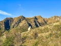 Sheep grazing on the slopes of the Southern Alps on the Isthmus peak track near Lake Hawea Royalty Free Stock Photo