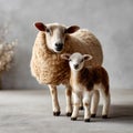 Sheep with Lamb Standing Together on Neutral Background with Copy Space Royalty Free Stock Photo