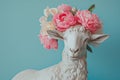 Sheep marble statue with tender pink and white peony flowers wreath on a head. Royalty Free Stock Photo