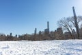 Sheep Meadow Covered in Snow at Central Park in New York City with the Midtown Manhattan Skyline during Winter Royalty Free Stock Photo