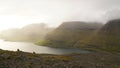 Sheep on a mountain at the Drangarnir Hike near SÃÆÃÂ¸rvÃÆÃÂ¡gur on the Faroe Islands in the Atlantic Ocean.