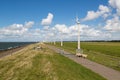 Sheep, sea and wind turbines Royalty Free Stock Photo