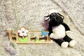 Sheep toys and wooden sign