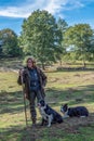 Sheepherder herding her sheep at Veluwe national park 9-2018