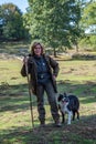 Sheepherder herding her sheep at Veluwe national park 9-2018