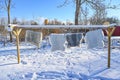 sheepskins hanging on drying rack a cold winterday in Sweden