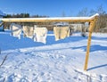 sheepskins hanging on drying rack a cold winterday in Sweden