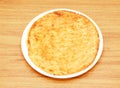 sheermal taftan, naan or kulcha, roti served in a dish isolated on wooden table side view of indian, pakistani food