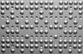 Sheet metal with dots and pits Royalty Free Stock Photo