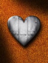 Sheet Metal Heart Against a Rusty Background Royalty Free Stock Photo