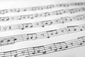 Sheet with music notes as background Royalty Free Stock Photo