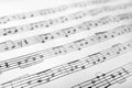 Sheet with music notes as background Royalty Free Stock Photo