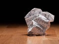 Sheet of music notes crumpled on the floor