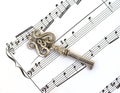 Sheet music staff & old key with treble clef