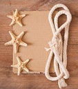 Sheet of old paper, rope and starfish Royalty Free Stock Photo