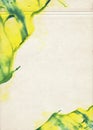 A sheet of old paper stained with green and yellow color watercolors. Vintage artistic watercolour background for creative design. Royalty Free Stock Photo