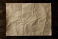 Sheet old vintage paper on the aged wooden background. Royalty Free Stock Photo