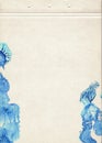 A sheet of old vintage paper stained with blots of blue watercolor paint. Fine grunge artistic colored background for original des