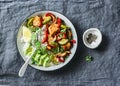 Sheet pan chicken and vegetables rice bowl - delicious diet balanced lunch on a grey background