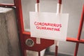 Coronavirus Quarantine on Paper Taped on the Iron Door Royalty Free Stock Photo