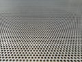 Sheet of a perforated stainless steel