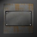 Sheet of rusty iron with perforation and frame Royalty Free Stock Photo
