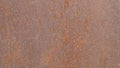 A sheet of rusty iron in red colors. Background picture.