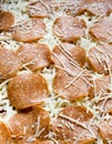 A Sheet of Uncooked Pepperoni Pizza Royalty Free Stock Photo