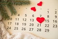 Sheet of wall calendar with red heart mark on 14 February - Valentines day Royalty Free Stock Photo