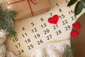 Sheet of wall calendar with red heart mark on 14 February - Valentines day Royalty Free Stock Photo