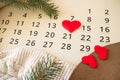 Sheet of wall calendar with red heart mark on 14 February - Valentines day Royalty Free Stock Photo