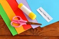 Sheets of colored paper, glue stick, scissors, a piece of white paper with the words Happy father's day Royalty Free Stock Photo