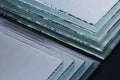 Sheets of Factory manufacturing tempered clear float glass panels cut to size Royalty Free Stock Photo
