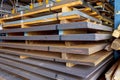 Sheets metal are stacked on a pallet Many pallets of sheet metal of different thicknesses stacked on top of each other