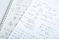 Sheets of paper with different mathematical formulas on table, closeup Royalty Free Stock Photo