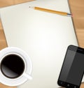 Sheets of paper, pencil, cup of coffee and smartphone