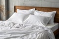 Sheets of unmade bed. White cotton sheets of an unmade bed Royalty Free Stock Photo