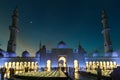 The Sheikh Zayed Grand Mosque in the evening with beautiful outdoor lighting