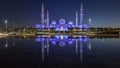 Sheikh Zayed Grand Mosque illuminated at night timelapse, Abu Dhabi, UAE. Royalty Free Stock Photo