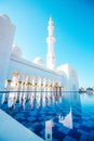 Sheikh Zayed Grand Mosque Minaret View With The Pool And Blue Sky Royalty Free Stock Photo