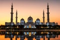 Sheikh Zayed Grand Mosque reflected on the water in Abu Dhabi emirate of UAE