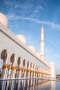 Sheikh Zayed Grand Mosque under the sunlight and a blue sky in Abu Dhabi, United Arab Emirates Royalty Free Stock Photo