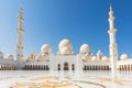 Sheikh Zayed Mosque - Abu Dhabi, United Arab Emirates. Beautiful white Grand Mosque courtyard Royalty Free Stock Photo