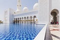 Sheikh Zayed Mosque Left Corridor with Pool, The Great Marble Grand Mosque at Abu Dhabi, UAE Royalty Free Stock Photo