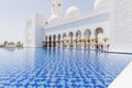 Sheikh Zayed Mosque Left Corridor with Pool, The Great Marble Grand Mosque at Abu Dhabi, UAE Royalty Free Stock Photo