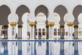 Sheikh Zayed Mosque Left Wing Corridor with Pool, The Great Marble Grand Mosque at Abu Dhabi, UAE Royalty Free Stock Photo