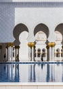 Sheikh Zayed Mosque Left Wing Corridor with Pool, The Great Marble Grand Mosque at Abu Dhabi, UAE Royalty Free Stock Photo