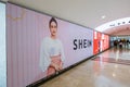 SHEIN advertisement board in a shopping mall in Malaysia. Shein is a Chinese online fast fashion retailer Royalty Free Stock Photo